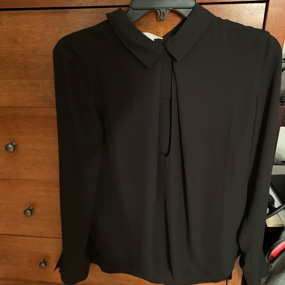 Black long sleeve blouse with cut out in chest